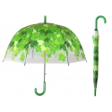 Przezroczysta parasolka w jesienne zielone liście